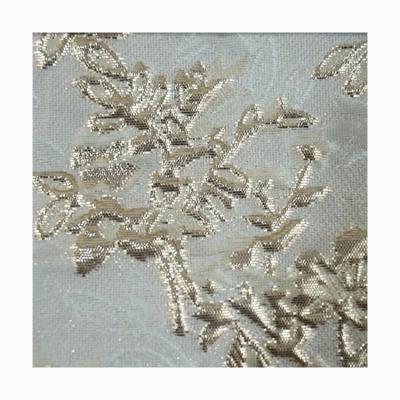 China Contour Shrink-Resistant Modern Bouquet Leaves Filigree 3d Jacquard Woven Metallic Fabric For Dress Woman for sale