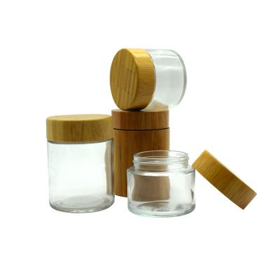 China Xt Cosmetic Custom Decoration Packaging Transparent Airtight Small Round Bamboo Glass Jar With Bamboo Wooden Lids for sale