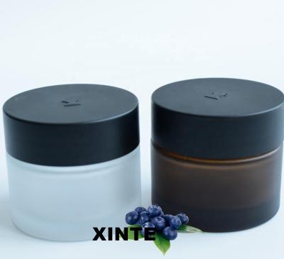 China Matte Cosmetic Cosmetic Frosted Amber Black Glass Cream Jar With Lid Cream Packaging Honey Food Flower Skin Care Packaging for sale