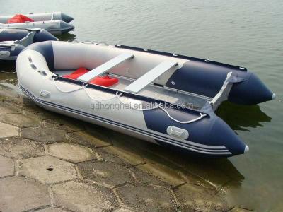 China Free Shipping Cheap Custom Inflatable Cruise PVC Boat With Outboard Motor for sale