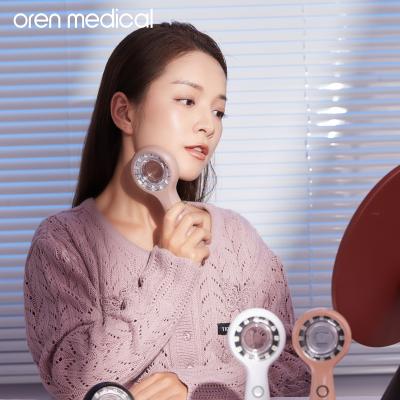 China Peel Tighten Oren Medical Handheld Beauty Device Photon Therapy Skin Care Innovation Anti Acne Facial Device Anti Aging Skin Rocker for sale