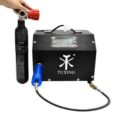 China Tuxing Oil Free Fan Cooling 12 Volt 4500psi 300bar Rifles PCP Air Compressor With LCD Screen for sale