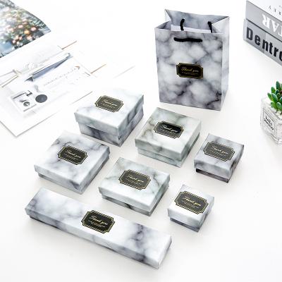 China Recyclable Black Gold Edge Marble Jewelry Ring Box Necklace Earring Earrings Marble Jewelry Box Packaging for sale