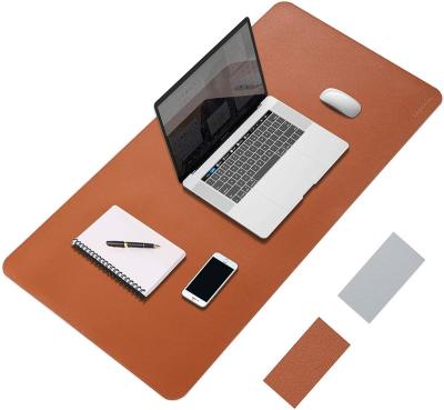 China Custom LOGO Home Office Mouse Pad Stocked Sitting Writing Mat Easy Clean PU Leather Desk Mat for sale