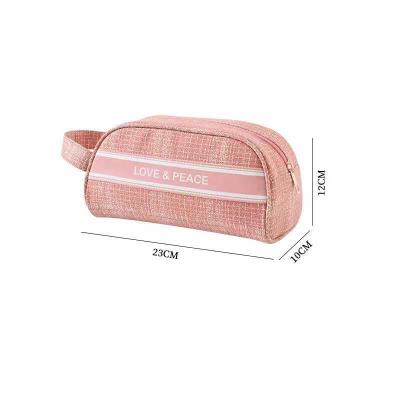 China Jacquard Weaving Hot Selling Custom Organizer Fashion Cosmetic Travel Bag Custom Makeup Washing Travel Storage Bag for sale