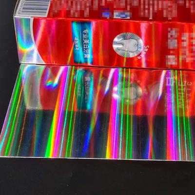 China Biodegradable Recyclable Compostable Plastic Free Curl Iridescent No Plastic Packaging Box Holographic Metallic Paper for sale