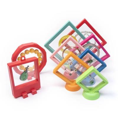 China Colorful Clear Floating Ring Medallion Coin Display 3D Frame Holder Storage Necklace Jewelry Racks for sale