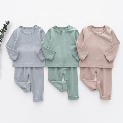 China Solid Color Cotton Children Sleepwear Pajama Set Solid Color Empty Pajama Set Long Soft Children Pajamas Set for sale