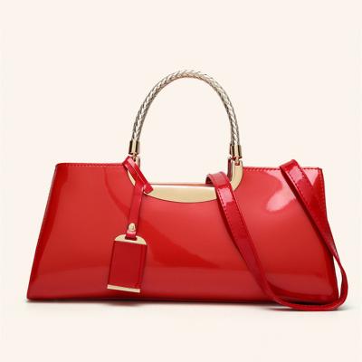 China Luxury women's handbags women's handbags solid color shoulder bags fashion large capacity clutch red lady bags with pendent for sale