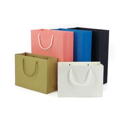 China Recyclable Custom Printed Luxury Gift Kraft Paper Shopping Bag For Clothing Shoes Coffee Tea for sale