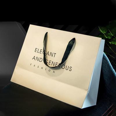 China Luxury Small Paper Bag with Ribbon Handle and Customised Printing for sale