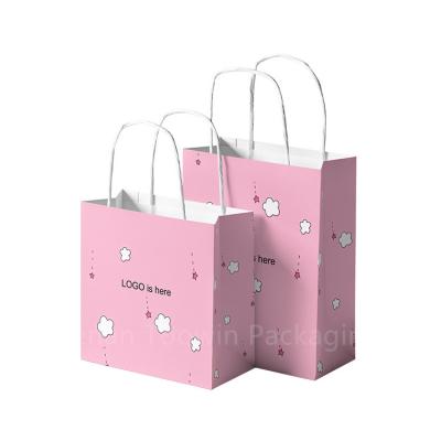 China Offsetprinting Twisted String Handle Paper Shopping Bags voor baby douche/kleding/juwelen Te koop