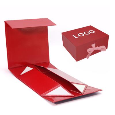 China Printing Logo Magnetic Foldable Gift Box Cardboard Paper Folding Packaging Boxes With Ribbon for sale