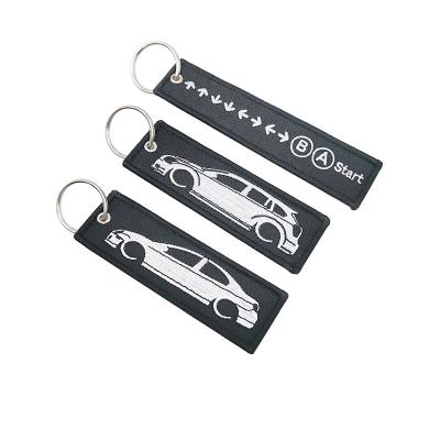 Китай Original Key Chain Logo Embroidery Patch Car Key Chain Fabric Letters Durable Embroidery Patch продается