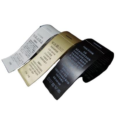 China Manufacturers Wholesale Ingredient Wash Label Golden Clothing Woven Labels Custom Care Labels for sale