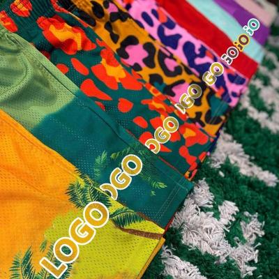 China Viable Wholesale Beach Shorts Wholesale Custom Print Swim Shorts Polyester Fashionable Basketball Mesh Casual Elastic Shorts Men for sale