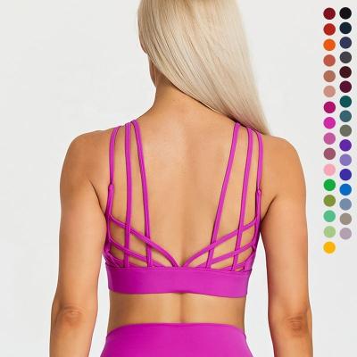 China Strappy Breathable Women's Sports Bra Padded Cross Cropped Bra Tops For Running Fitness Workout Yoga Bras for sale