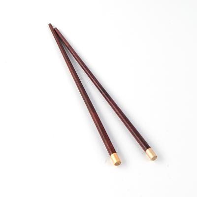 China Long Sustainable Reusable Brown Cylindrical Wooden Chopsticks Natural Healthy For Cooking Eating for sale