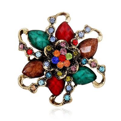 China Cheap Brooches In Bulk China New Fashion Jewelry Resin Cheap Brooches Colorful Crystal Flower Brooch In Bulk for sale