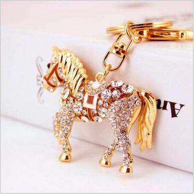 China Creative Cute Alloy Cavity Horse Diamond Metal Cartoon Key Chain for sale