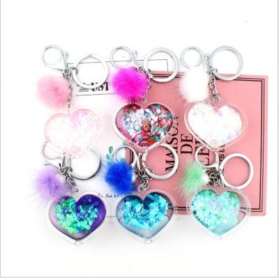 China Wholesale Fashion Metal Glitter Heart Pom Poms Valentine's Day Series Small Gifts Key Chain for sale