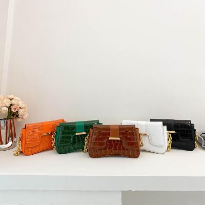 China Patent leather 2023 popular fashion ins female bag female one shoulder bag crocodile print designer for armpit chain acrylic Bag tide for sale