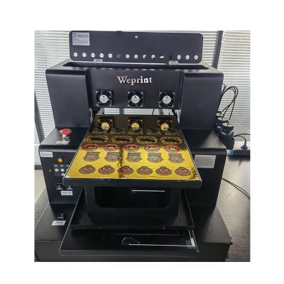 China Printing on gold foil glass UV flatbed machine hot sale a4 UV printer WEPRINT 2021 a4 UV printer for sale