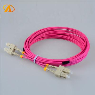 China Indoor OM4 SC to SC Fiber Patch Cable 2M Duplex 10G Multimode Fiber Optic Cable Cord OD: 3.0MM SC/ST/FC/LC Fiber for sale