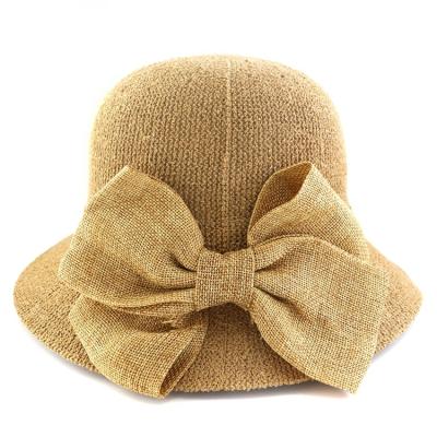 China Summer Striped Women's Fashion Straw Made Bow Foldable Knitted Panama Bucket Hat Panama Beach Sun Straw Hat for sale