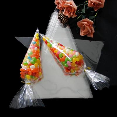 China Barrier 100pcs OEM Printing Design OPP Bag Clear Candy Popcorn Packaging Bag For Chocolate Food Packaging Triangle Bags Wholesale for sale