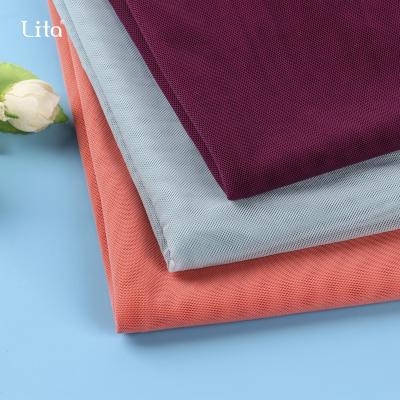 China Hot Selling 2021 Soft Stretch Tulle Mesh Fabric 40D Nylon 4 Way Stretch Power Net Fabric For Sleepwear Lingerie for sale