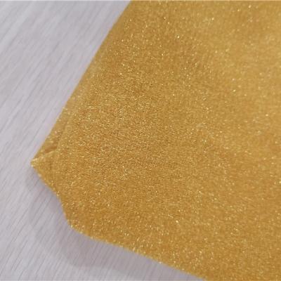 China Breathable Nylon For Dress Tulle Fabric Soft Golden Gold Mesh Fabric for sale