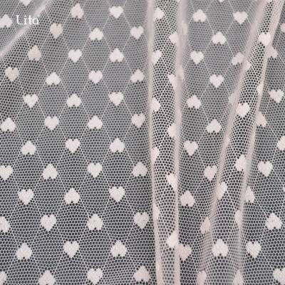 China Beautiful Lace Dot Elastic Nylon Stretch Heart Design Soft Lace Fabric For Underwear Kids Clothes for sale