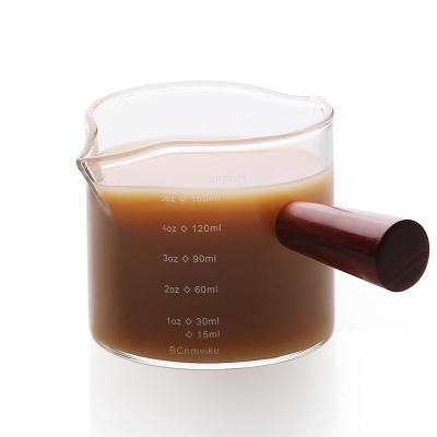 China BCnmviku 150ml Viable Glass Measuring Cups Milk Cup Espresso Shot Glasses For Coffee Glass Measuring Cups With Wooden Handle for sale