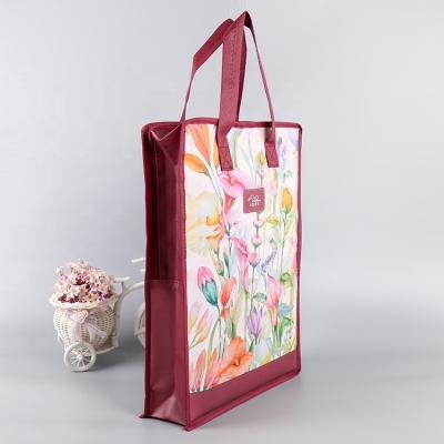 China Designer Bopp Laminated Handled Zipper Nonwoven Shopping Bag for sale