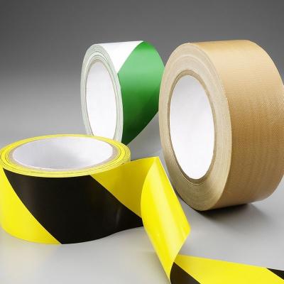 China Direct Supply PVC Anti-Slip Barrier Self-Adhesive Floor Marking Tape 0.115mm*1260mm*30M Grain Printable Self-Adhesive for sale