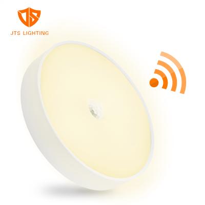 China Modern CCT USB LED Wall Lamp Wireless Rechargeable Sensor Night Light For Bedroom for sale