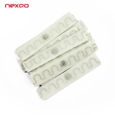 China Washable Silicone Polyester UHF RFID Laundry Tag With Long Reading Distance for sale