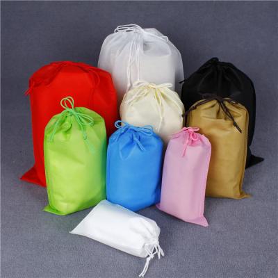 China Waterproof Nonwoven Drawstring Clothes Toy Storage Bag Dustproof Shoes Storage Bags Package Pouch Travel Sundries Organizer Cosmetics Bag for sale