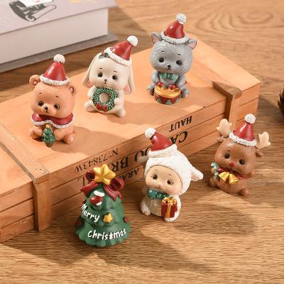 China Beautiful Colorful Christmas resin family small animal ornaments creative home decoration mini Santa Claus Christmas gifts for sale