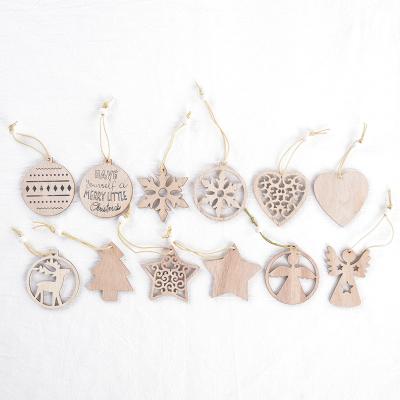 China Beautiful Colorful Christmas decoration manufacturers supply boxed wooden snowflake small pendant laser engraving openwork hanging ornament for sale