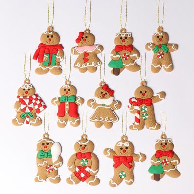 China Beautiful Colorful New gingerbread man DIY Christmas tree charm snowflake pull small charm Santa Claus for sale