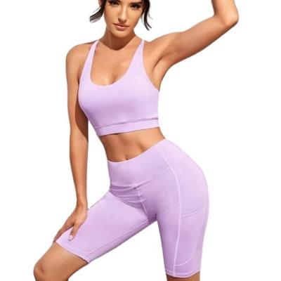 China Breathable Women Sports Yoga Bra And High Waist Out Of Pocket Yoga Shorts Tummy Control Workout Running Yoga Sporty Non-Transparent Set for sale