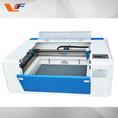 China Co2 laser engraving machine for cutting wood plastic acrylic leather rubber glass desktop laser cutting machine 4060 for sale