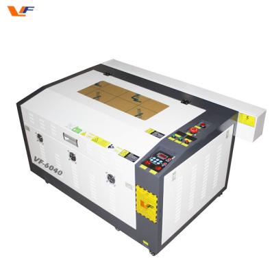 China 6040 6090 1390 laser cutting machine visual acuity examination apparatus small co2 laser cutter for sale