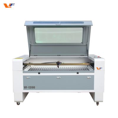 China 80w 100w 1390 laser cutter machine for fabric rubber plywood glass acrylic Co2 laser cutting machine engraving for sale