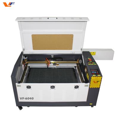 China Mini Laser Engraving Machine for Sale Low Cost Laser Cutting Machine 40w 50w 60w 80w Laser Tube 1300*900mm Cutting Area CO2 for sale