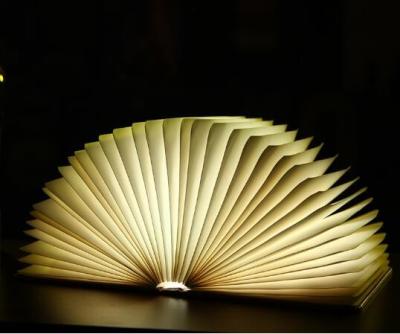 China PU Cover 360 Degree Adjustable Rechargable Book Shape Light For Gift for sale