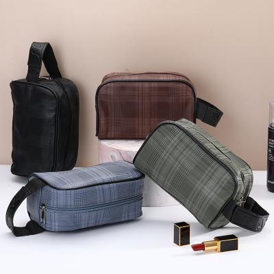 China High-end fashion high-end travel cosmetic bag unisex portable waterproof PU leather makeup bag for sale