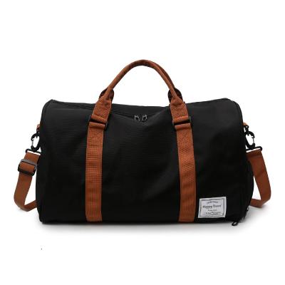 China Fashion Classic Messenger Duffel Bag Large Capacity Black Foldable Men Travel Bag for sale